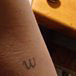 We weren't kidding when we said Katie has a tattoo commemorating her Wednesday Night Dinners