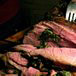 Carving the Leg of Lamb with Pomegranate Molasses