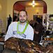 Peter shows off the finished roast lamb. We didn't know jack about trussing a lamb in those days