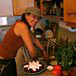 Zora in a common stance, restoring order at the sink. 